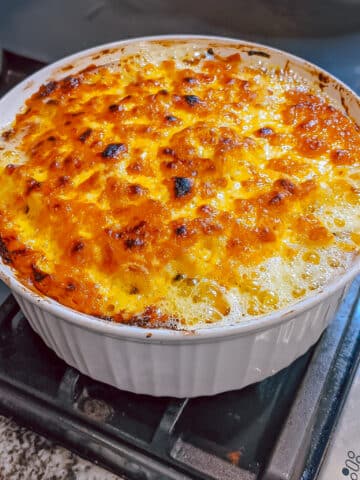 Overhead view of baked macaroni and cheese with golden top